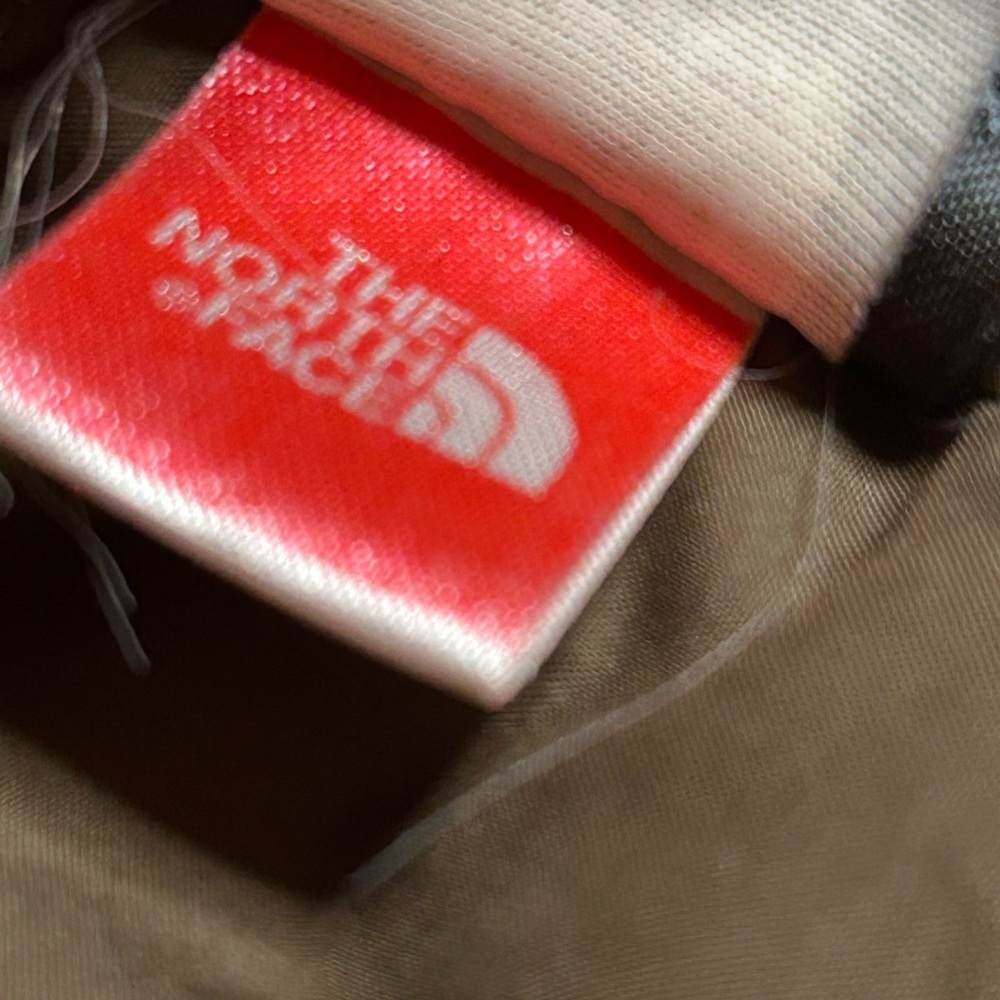 The North Face brown Puffer Jacket. Stove sack. 700.  One repair - Picture 13 of 16